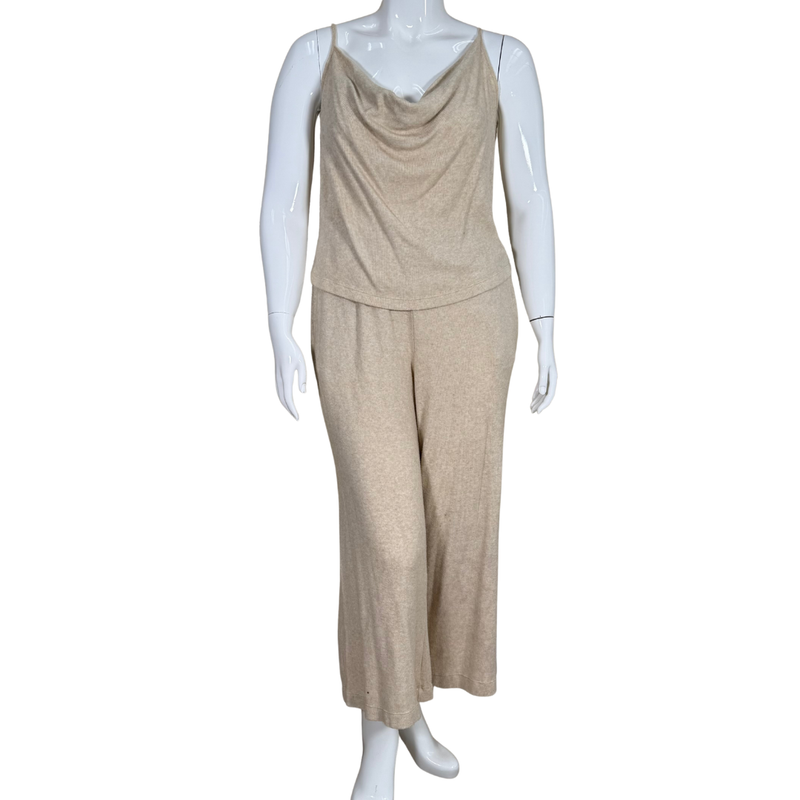 Load image into Gallery viewer, Mannequin wearing a beige sleeveless top and wide-leg pants on a white background
