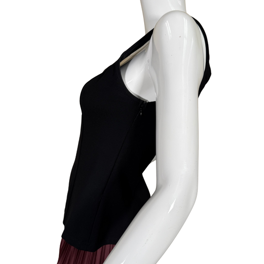 Black tank top on a white mannequin against a white background
