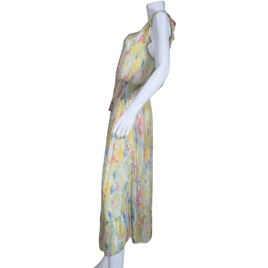 Mannequin wearing a colorful floral dress on a white background