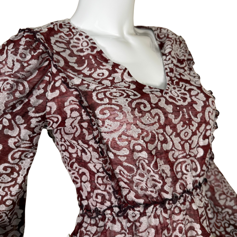 Load image into Gallery viewer, Make a stylish statement with this donated Anthropologie Sheer Burgundy Top with White Ornaments, adorned with a delicate silver damask pattern
