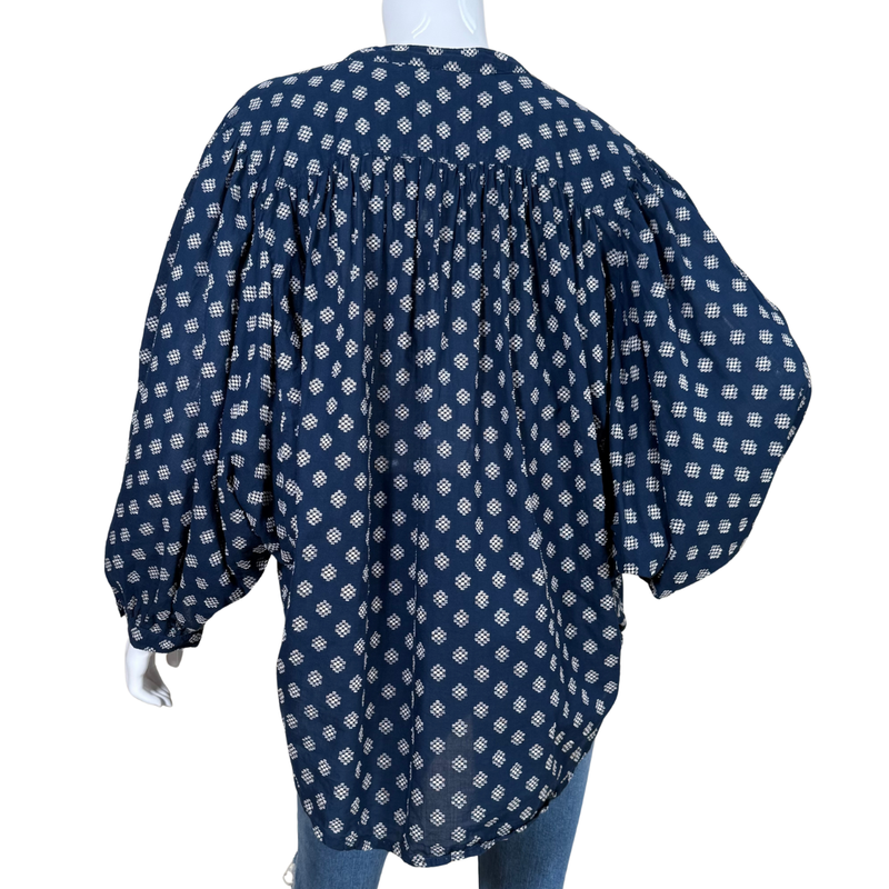Load image into Gallery viewer, Navy blue blouse with white geometric pattern on a mannequin against a white background
