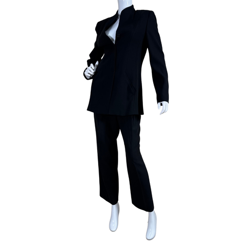 Black suit on a mannequin against a white background