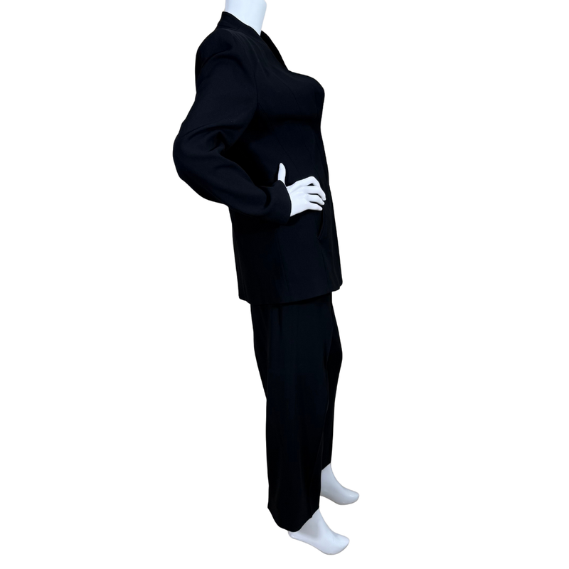 Load image into Gallery viewer, Armani Collezioni Black Suit Set features a sharply tailored longline blazer with a structured silhouette, subtle shoulder padding, and a high mandarin collar
