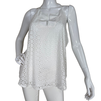 donated Athleta White Eyelet Sleeveless Top features a delicate eyelet overlay with a subtle geometric pattern, adding texture and charm