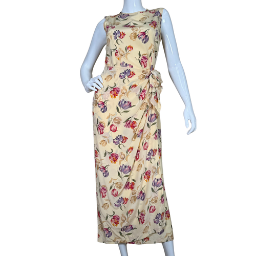 August Silk Floor-length Vibrant Floral Dress is a sleeveless, floor-length piece with a soft cream base adorned with a vibrant floral print