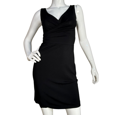  BCBG Maxazria Black Wrap Dress. Designed with a figure-flattering ruched bodice and a soft, stretchy fit, this sleeveless dress transitions seamlessly from day to night