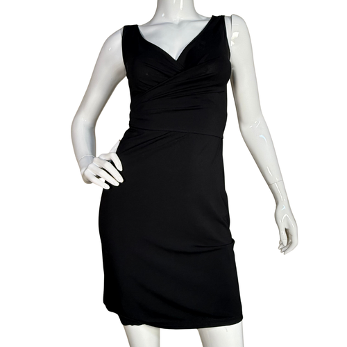  BCBG Maxazria Black Wrap Dress. Designed with a figure-flattering ruched bodice and a soft, stretchy fit, this sleeveless dress transitions seamlessly from day to night