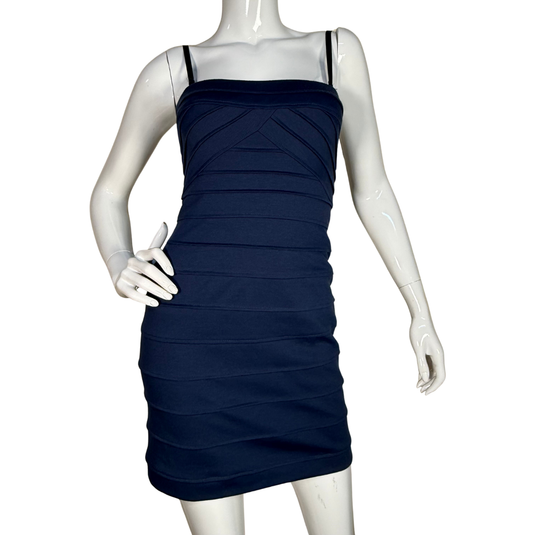 Navy blue dress on a mannequin against a white background
