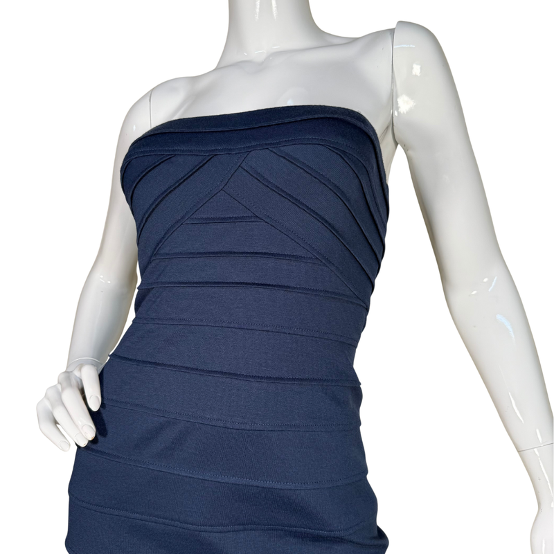 Load image into Gallery viewer, Navy blue strapless dress on a mannequin against a white background
