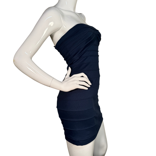 Navy strapless dress on a mannequin against a white background