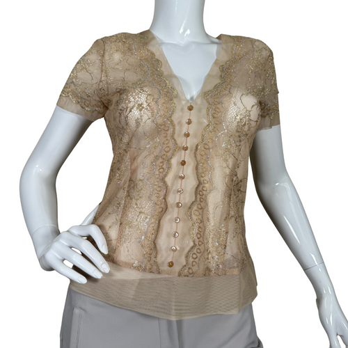 pre-loved BCBG Maxazria Golden Lacy Blouse is perfect for adding a touch of sophistication to any outfit. It features intricate floral lace detailing with delicate gold accents, creating a luxurious and feminine look