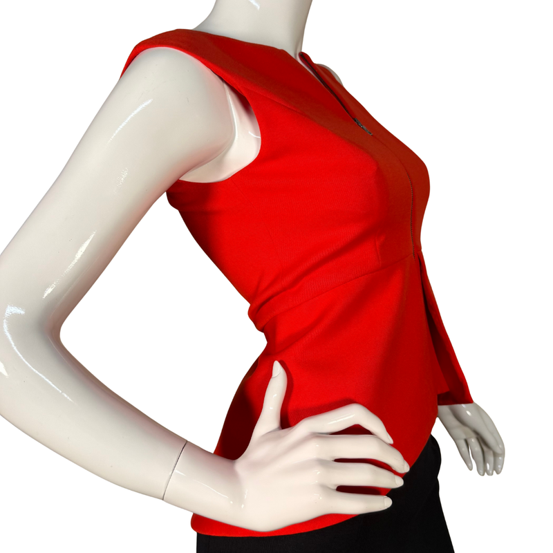 Load image into Gallery viewer, Red sleeveless top on a mannequin with a white background
