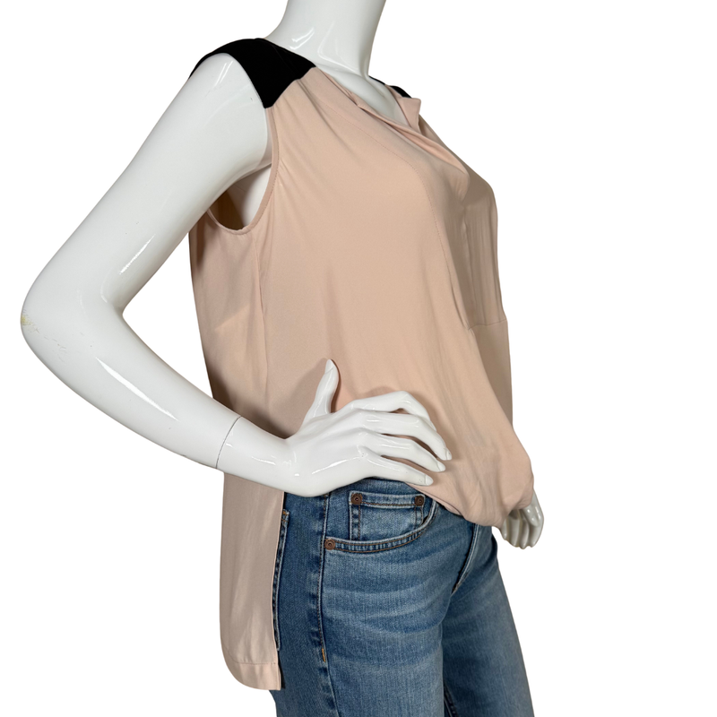 Load image into Gallery viewer, Mannequin wearing a beige sleeveless top and blue jeans on a white background
