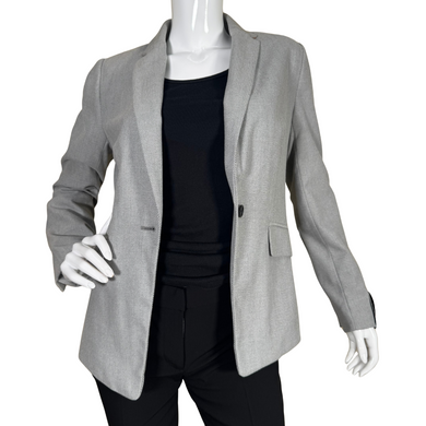 thrifted Banana Republic Gray Knit Blazer Jacket presents a polished and professional aesthetic with its subtle herringbone pattern and structured fit