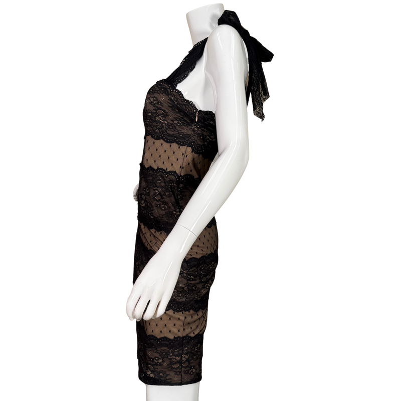 Load image into Gallery viewer, Black lace dress on a white mannequin against a white background

