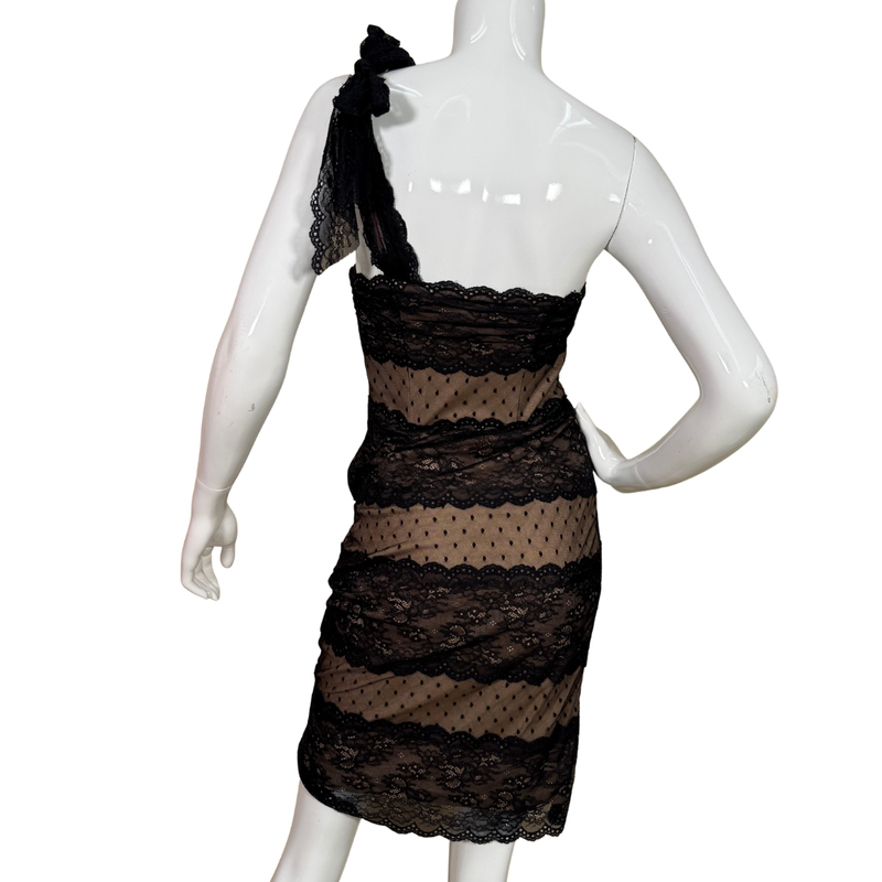 Load image into Gallery viewer, Black lace dress on a white mannequin against a white background
