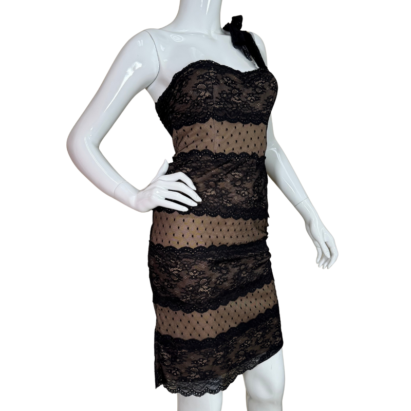 Load image into Gallery viewer, Black lace dress on a white mannequin against a white background
