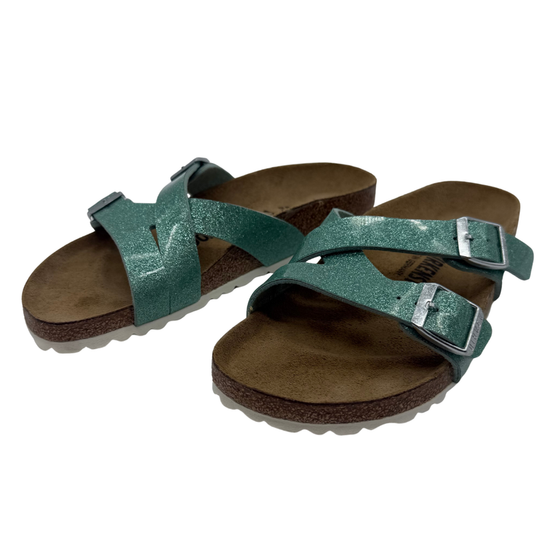 Load image into Gallery viewer, Pair of green sandals with brown soles on a white background
