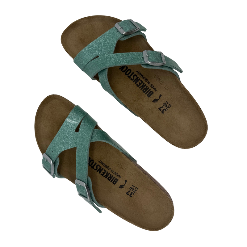 Load image into Gallery viewer, Pair of green sandals with brown soles on a white background

