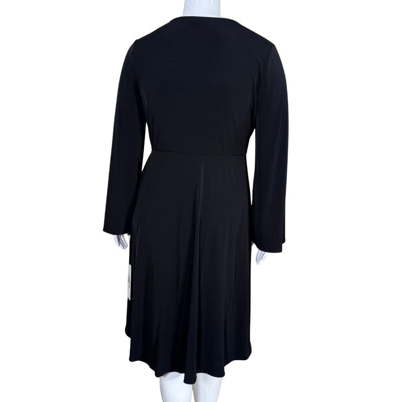 Load image into Gallery viewer, Black dress on a mannequin against a white background
