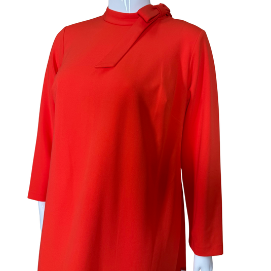elegant donated Calvin Klein Red Long-Sleeve Shift Dress with Bow Detail features a high neckline accented with a charming bow tie on the shoulder, adding a touch of sophistication