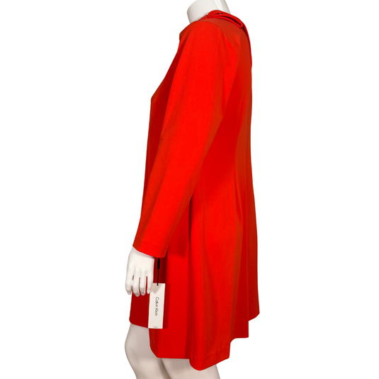 elegant donated Calvin Klein Red Long-Sleeve Shift Dress with Bow Detail features a high neckline accented with a charming bow tie on the shoulder, adding a touch of sophistication