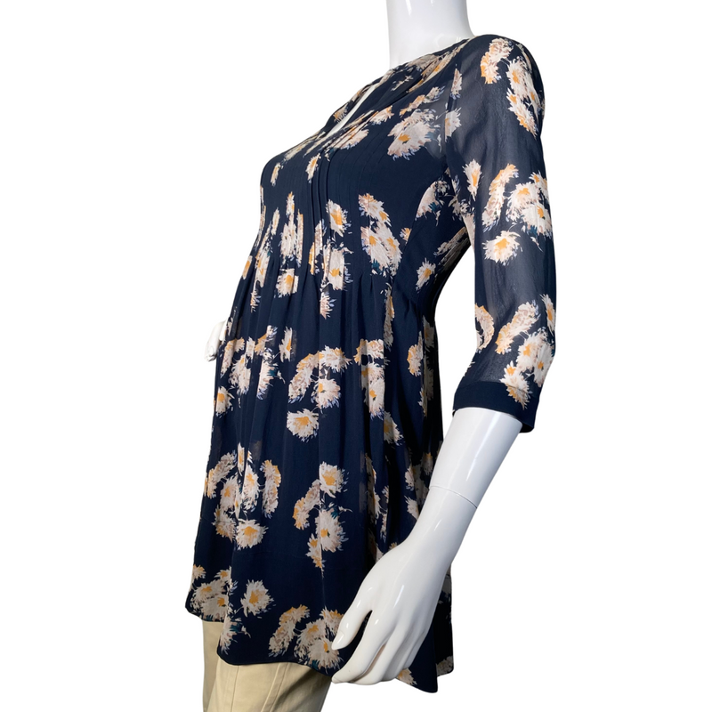 Load image into Gallery viewer, Club Monaco Floral Sheer Silk Blouse is stylish navy blue floral tunic blouse with a flowy, relaxed fit, perfect for casual wear or dressing up - side view
