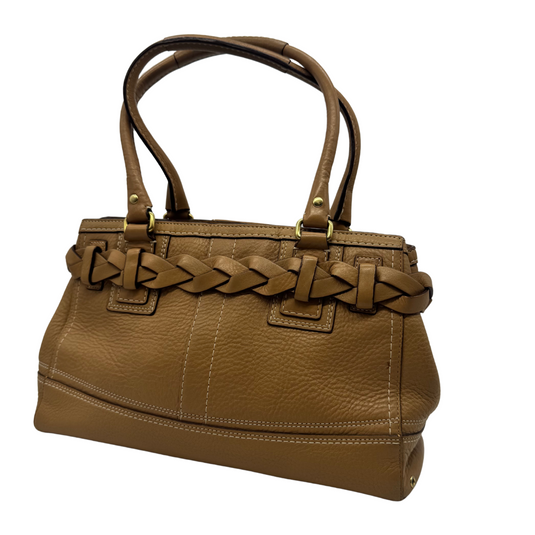 Coach Beige Leather Shoulder Bag is crafted from high-quality caramel brown pebbled leather, featuring beautiful braided detailing on the sides and signature gold-tone horsebit hardware on the front for a sophisticated equestrian-inspired touch.