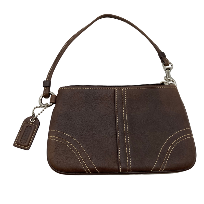 Load image into Gallery viewer, This pre-loved Coach Mini Brown Wristlet Pouch item is a compact wristlet pouch in a rich brown tone with contrast white stitching. It features a zippered closure and a detachable wrist strap for convenient carrying.
