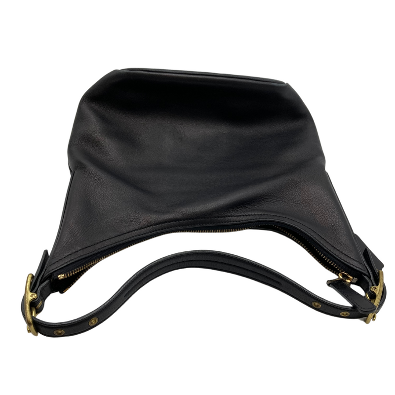 Load image into Gallery viewer, Coach Small Black Cresent Shape Handbag is a sleek black leather handbag featuring a minimalist design with subtle stitching details for added elegance. It has a single sturdy strap for carrying on the shoulder or as a wristlet
