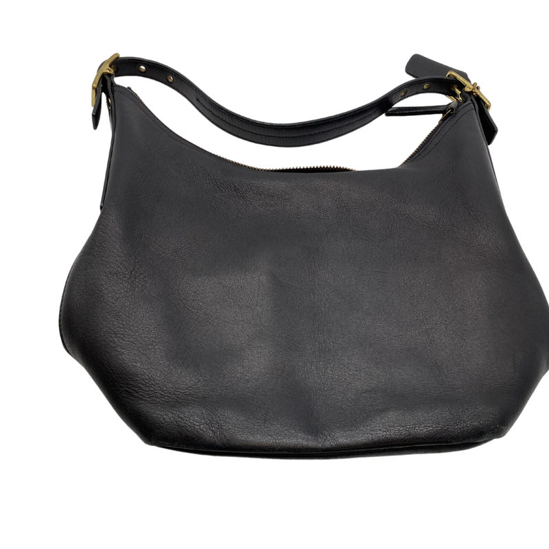 Load image into Gallery viewer, Coach Small Black Cresent Shape Handbag is a sleek black leather handbag featuring a minimalist design with subtle stitching details for added elegance. It has a single sturdy strap for carrying on the shoulder or as a wristlet
