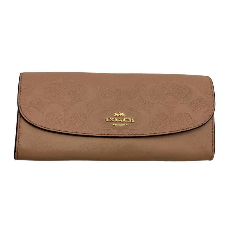 Load image into Gallery viewer, pre-loved Coach Small Monogram Brown Purse is a stylish Coach wristlet crafted from brown canvas featuring the brand&#39;s iconic &quot;C&quot; logo print. It has a compact size, ideal for carrying essentials, and includes a single leather strap with silver-tone hardware for easy handling
