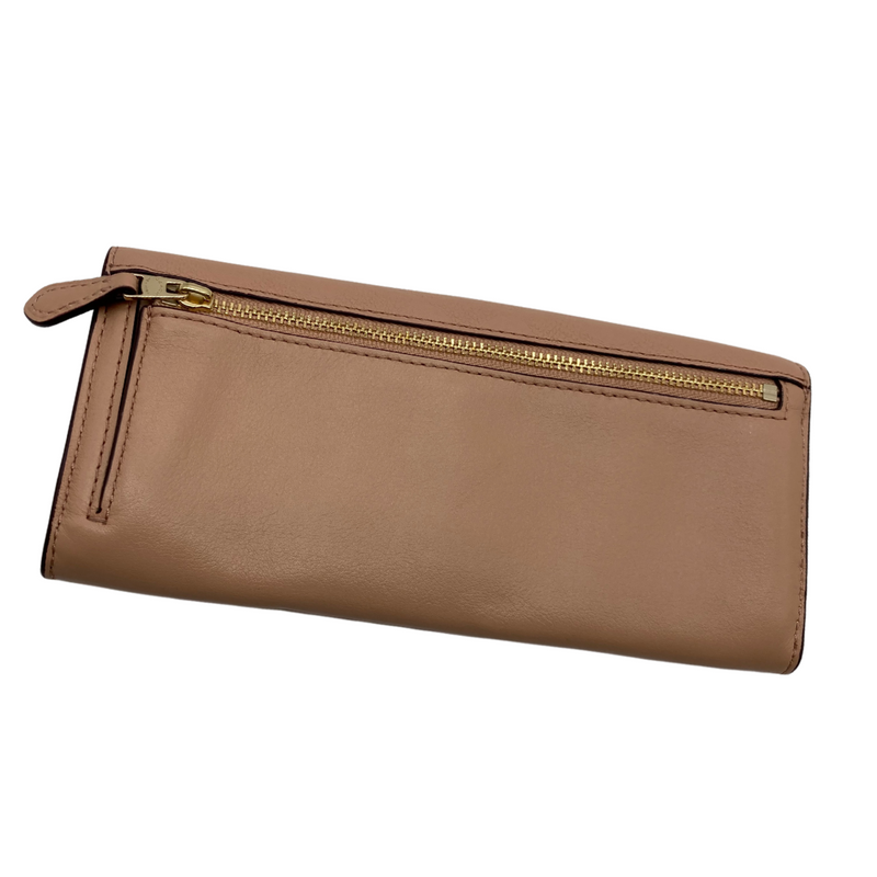 Load image into Gallery viewer, pre-loved Coach Small Monogram Brown Purse is a stylish Coach wristlet crafted from brown canvas featuring the brand&#39;s iconic &quot;C&quot; logo print. It has a compact size, ideal for carrying essentials, and includes a single leather strap with silver-tone hardware for easy handling
