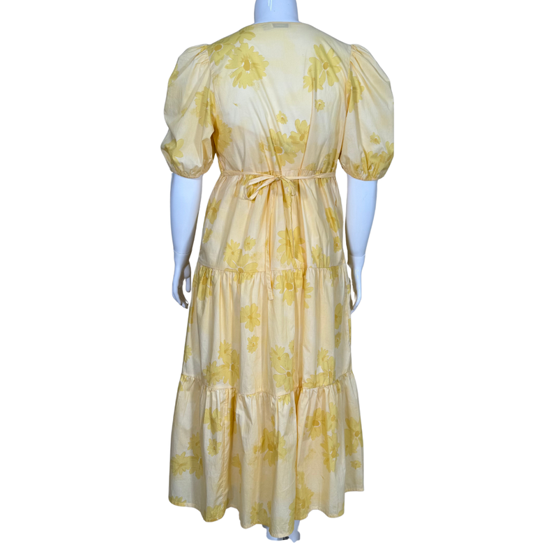 Load image into Gallery viewer, Yellow floral dress on a mannequin against a white background
