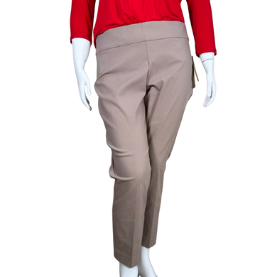 Mannequin wearing beige pants and a red top on a white background
