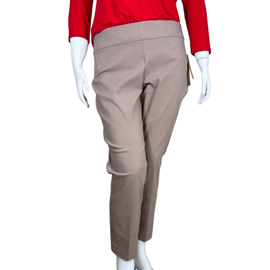 Mannequin wearing beige pants and a red top on a white background