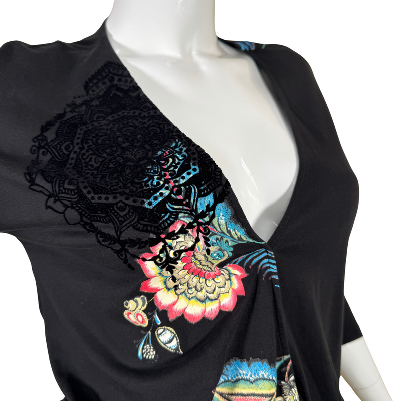 Load image into Gallery viewer,  pre-loved Desigual Black Top with Abstract Flowers with a stylish draped design and a flattering V-neckline - close up view
