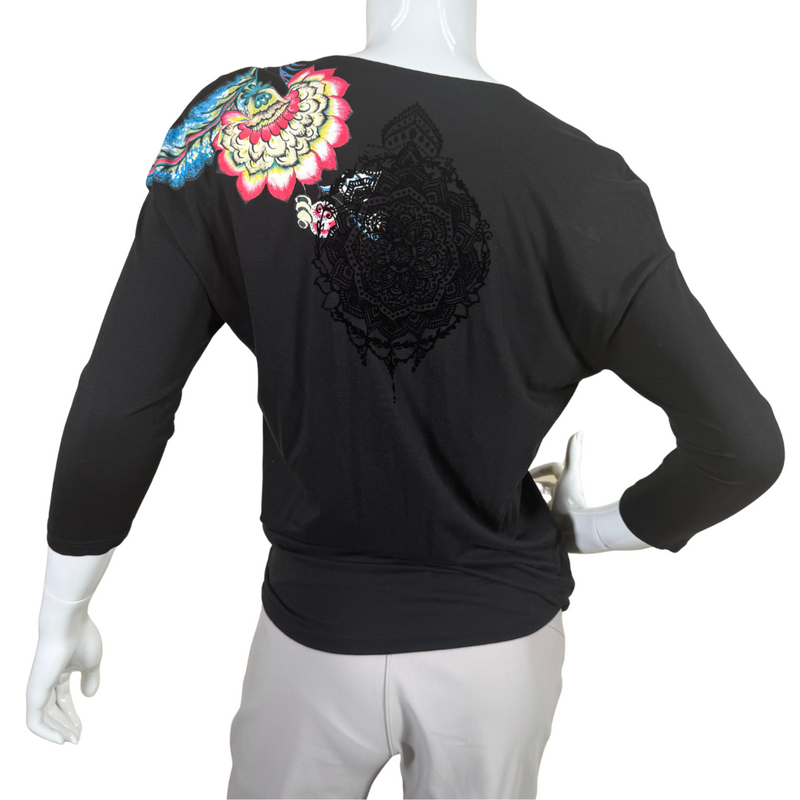 Load image into Gallery viewer,  pre-loved Desigual Black Top with Abstract Flowers with a stylish draped design and a flattering V-neckline - backside view
