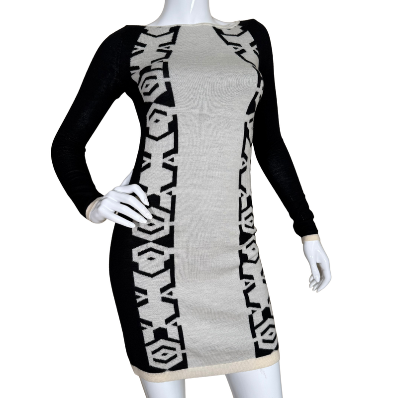 Load image into Gallery viewer, Mannequin wearing a black and white patterned dress on a white background
