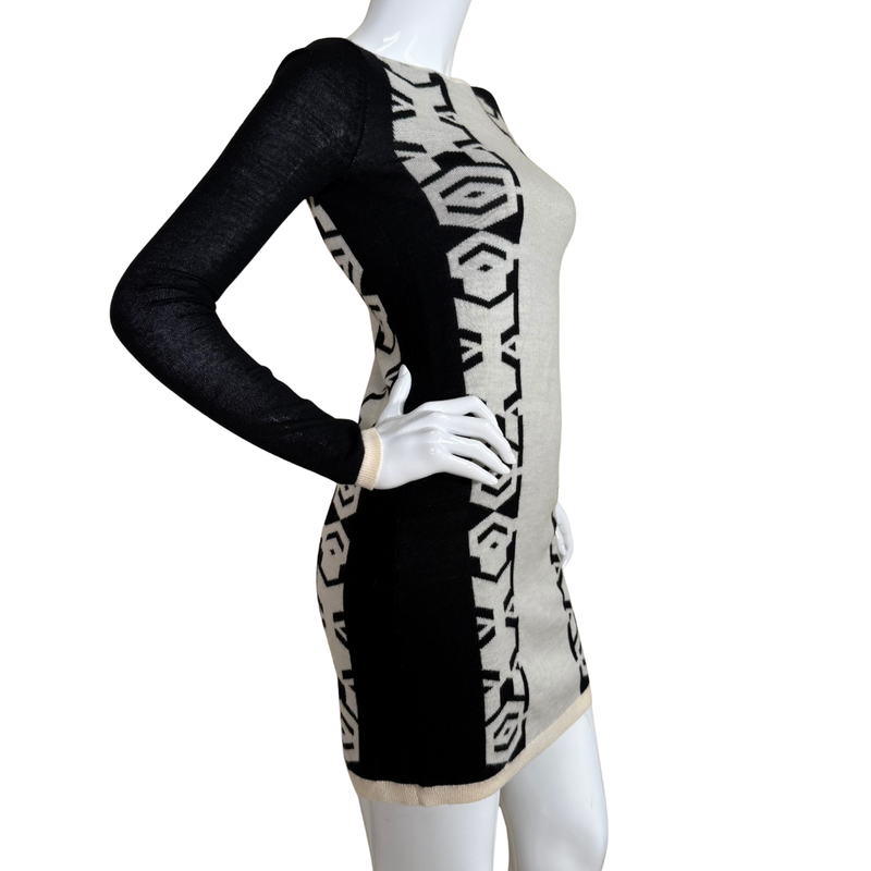 Load image into Gallery viewer, Mannequin wearing a black and white patterned dress on a white background
