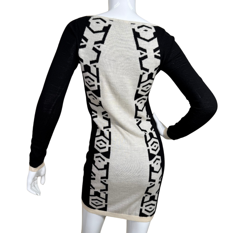 Load image into Gallery viewer, Mannequin wearing a black and white patterned dress on a white background
