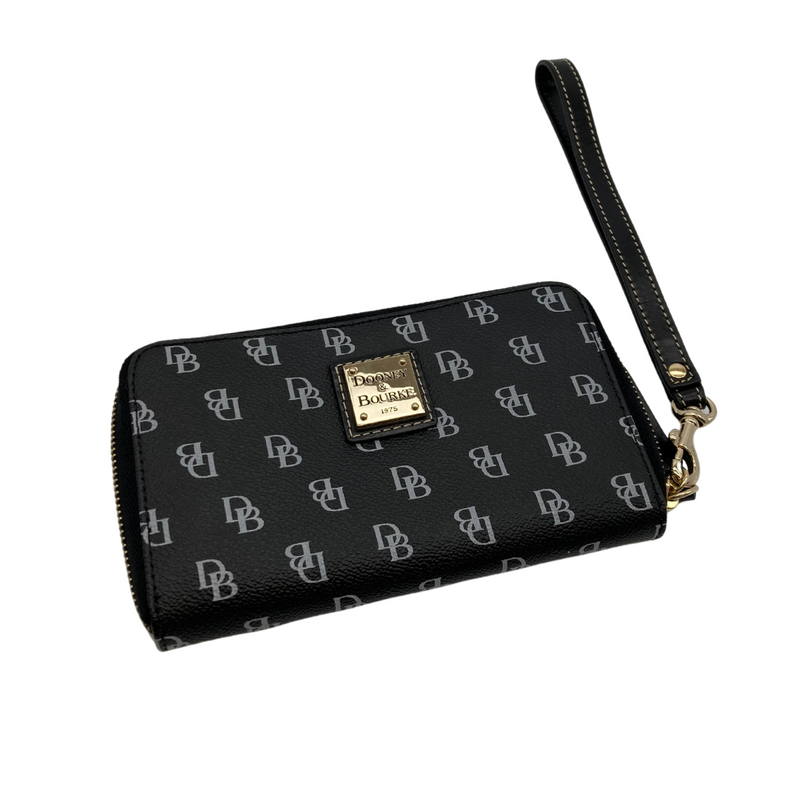 Load image into Gallery viewer, pre-loved Dooney Bourke Black Wristlet with Monogram, features the brand&#39;s signature monogram print in a sleek black and white design
