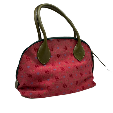 charming thrifted Dooney & Bourke Red Handbag with Colorful Heart and Monogram Pattern features a playful pink canvas body adorned with a whimsical pattern of red “DB” logos interspersed with tiny colorful hearts and stars
