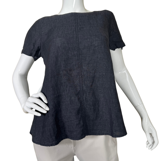 Eileen Fisher Linen Denim-like Top is a minimalist yet elegant piece featuring a dark, solid-colored fabric with a subtle texture