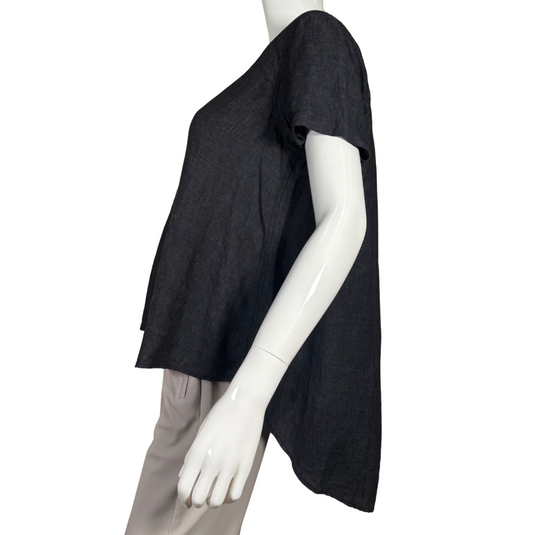 Eileen Fisher Linen Denim-like Top is a minimalist yet elegant piece featuring a dark, solid-colored fabric with a subtle texture