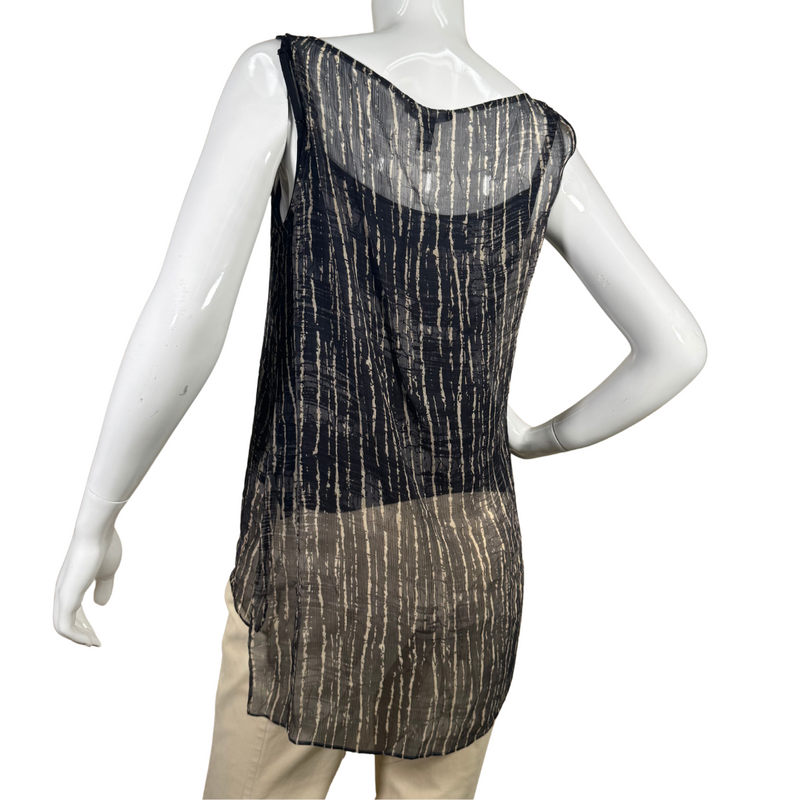 Load image into Gallery viewer, Eileen Fisher Zebra Sheer Sleeveless Blouse is a stylish sleeveless top features a lightweight, semi-sheer fabric with a navy blue and white abstract stripe pattern - backside view
