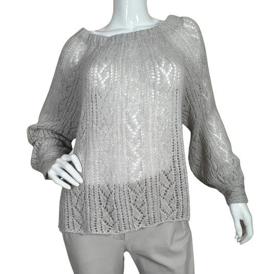 pre-loved Free People Gray Knit Sweater is a stylish and cozy light gray knitted sweater featuring an intricate open-knit pattern throughout