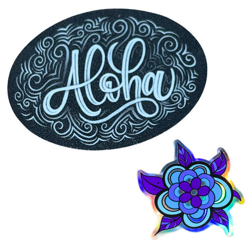 Aloha sticker pack featuring a one oval sticker with the word Aloha hand-lettered in white, and the second sticker as a small turtle with a flower as it's shell on holographic material using blues and purples