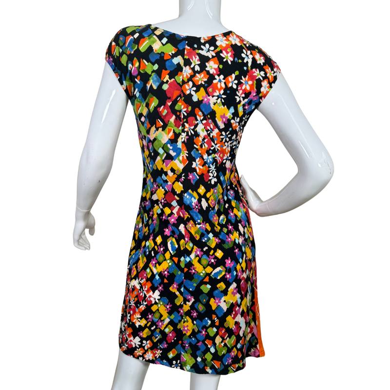 Load image into Gallery viewer, Mannequin wearing a colorful floral dress on a white background
