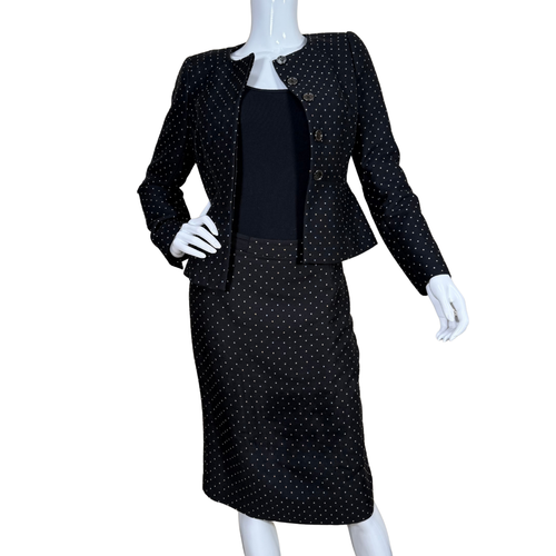 pre-loved outfit is a refined Jigsaw Polka Dot Black & White Suit Set adorned with a subtle, all-over polka dot pattern in a light gold tone, adding a touch of vintage glam